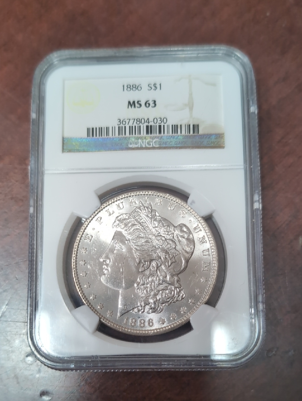 1886 Morgan Silver Dollar NGC MS63 - TONER!